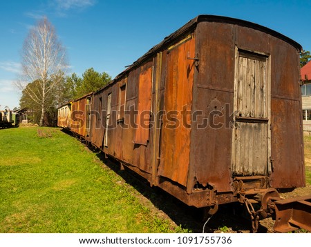 vintage antique railway car on a narrow gauge railway