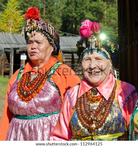 ULAN-UDE, RUSSIA - SEPTEMBER 13: Unidentified woman in traditional costume Christian Believers. Costume show for the guests of  Baikal Economic Forum, September 13, 2012 in Ulan-Ude, Buryatia, Russia
