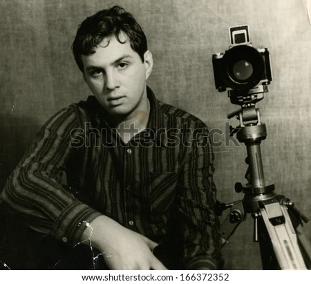 KURSK - CIRCA 1976: Photographer in his studio, Kursk, Russia, USSR, 1976