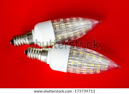 Two led lamp isolated on red background