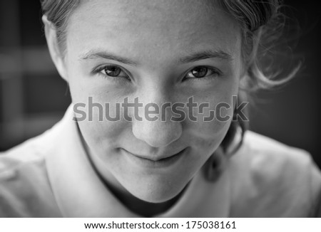 Black and white portrait of a  teen girl. Real people series