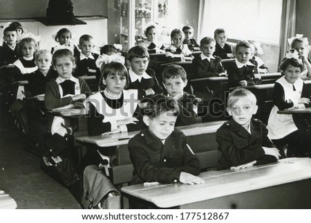 KURSK, USSR - CIRCA 1976: An antique photo shows group portrait of a first-graders of secondary schools.
