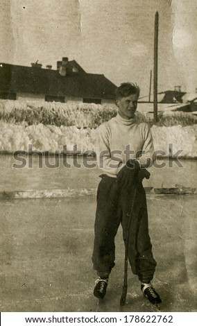 MOSCOW, USSR - CIRCA 1930s : An antique photo shows  hockey player.. \