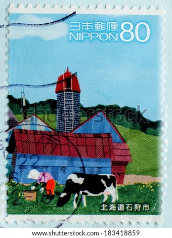 JAPAN - CIRCA 1990th: A stamp printed in Japan shows a dairy farm and cows on the meadow, circa 1990th