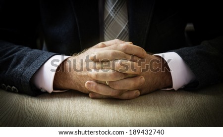 Businessman  hands clasped