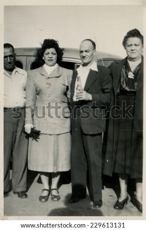 CANADA - CIRCA 1940s: Vintage photo shows  portrait of an elderly couple and their friends.
