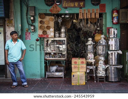 BANGKOK, THAILAND - DECEMBER 25, 2014: Street Photography of  the owner of the hardware store.