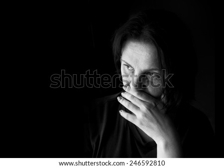 Black and white portrait of a sad woman