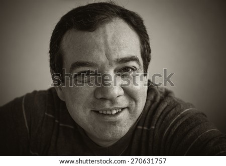 Smiling mature man. Black and white portrait.