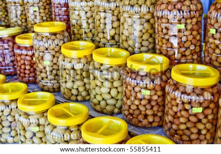 Canned green olives in cans. Farm shop, Gemlik, Turkey