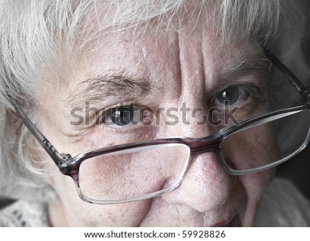 Mature woman in glasses