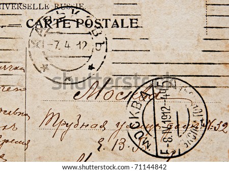 RUSSIA - CIRCA 1912: Fragment of a old mailing envelope with two postage stamp and handwriting, circa 1912