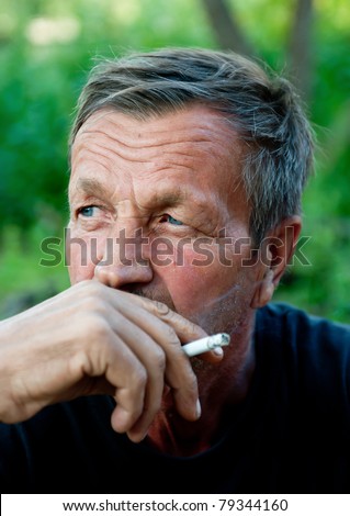 old man smokes