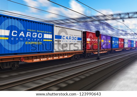 Freight train with color cargo containers passing railway station in winter with motion blur effect