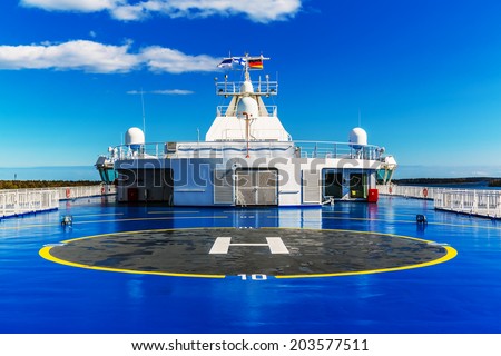 Helipad for helicopter on the upper deck of big cruise ship