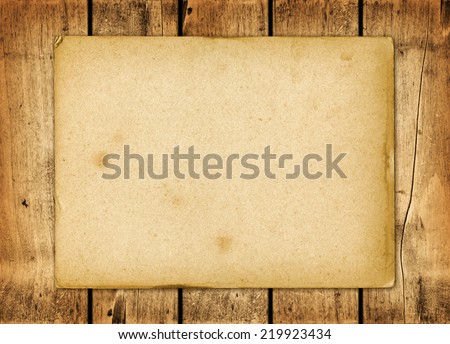 Blank vintage paper sheet on a wood board panel