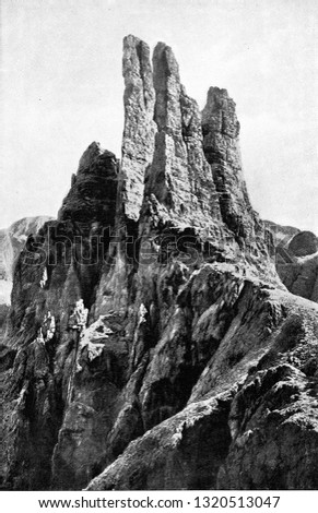 The Vajolet towers in the Rosengarten chain, vintage engraved illustration. From the Universe and Humanity, 1910.