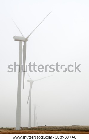 two windmills for renowable electric production with fog