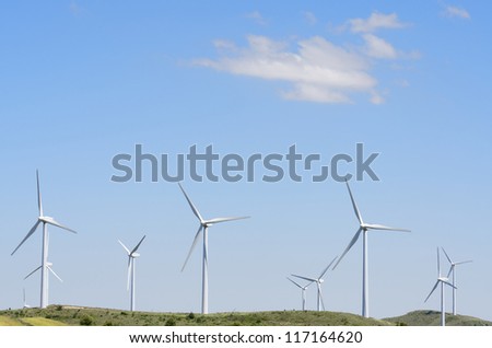 group of windmills for renewable electric energy production on a hill, Aras, Navarre, Spain
