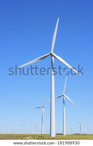 group of windmills for renewable electric energy production group of windmills for renewable electric energy production