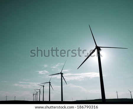 Windmills for electric power production at sunset Pozuelo de Aragon Zaragoza Aragon Spain Windmills for electric power production at sunset Pozuelo de Aragon Zaragoza Aragon Spain
