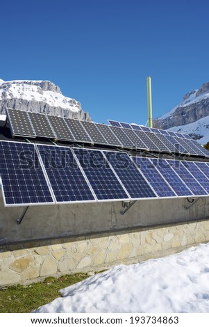 Photovoltaic panels on the roof of a hut in the Pyrenees, Aragues Valley, Aragon, Huesca, Spain.