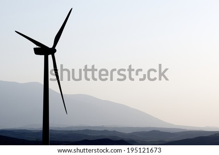 silhouette of a group of windmills for renewable electric energy production, Fuendejalon, Zaragoza, Aragon, Spain