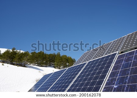 Photovoltaic panels on the roof of a hut in the Pyrenees, Aragues Valley, Aragon, Huesca, Spain.