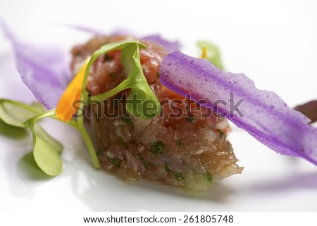 Close-up of a plate of pork steak tartar.