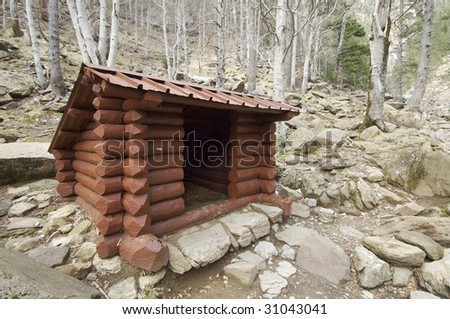 wooden shelter in a beech forest