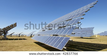 Solar field with blue sky