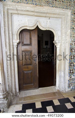 warped door inside the palace at Sintra, Portugal