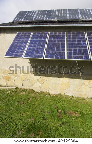 group of PV panels on the roof of a house in the Pyrenees