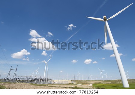 windmills for  electric power production and  electrical substation