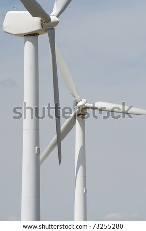 two windmills  for renewable electric energy production