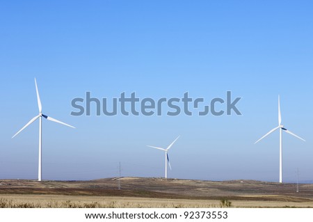 windmills for electric power generation alternative with blue sky