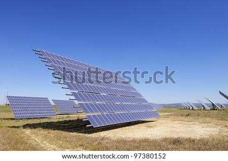 photovoltaic panels for renewable electrical energy production with clear blue sky