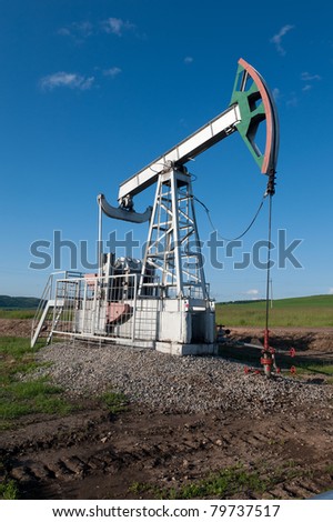 Oil pump on a green field