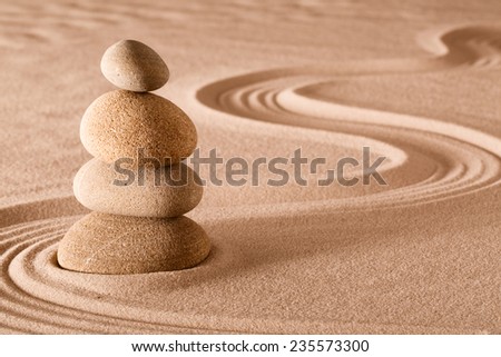 zen meditation garden stack of stones, relaxation and meditation through simplicity harmony and rock balance lead to health and wellness, balancing and concentration background with copy space