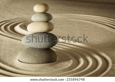 balance and harmony in zen meditation garden relaxation and simplicity for concentration. Sand and stone form nice lines and pattern
