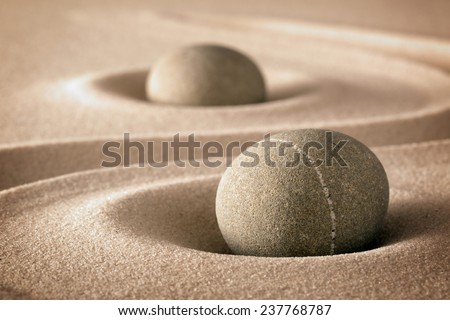 purity and spirituality in the harmony of a zen garden stones and lines in sand for concentration and relaxation pure nature or spa wellness background