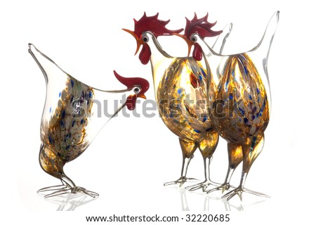 gossip chicken small talk still life of two glass roosters hen in conversation colorful isolated white background sharing secret chatting shouting loud heavy discussion verbal communication talking