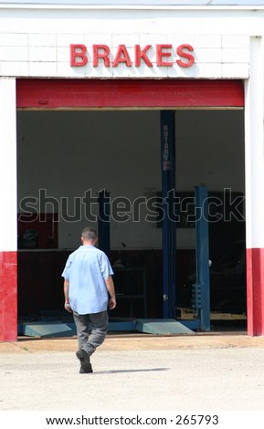 employee walking to work at a Brake shop
