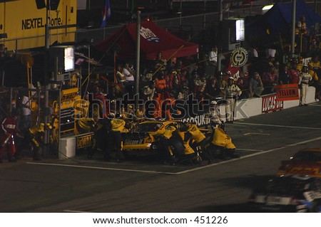NASCAR Nextel Cup driver Matt Kenseth and pit crew during pit stop