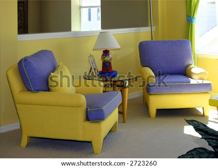 yellow welcoming sitting area in upscale home