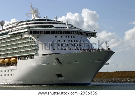 Bow of cruise ship leaving port for a dream vacation
