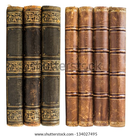 black and brown old books with golden design isolated on white