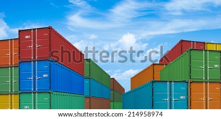 export or import shipping cargo containers stacks in port under sky