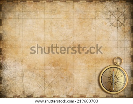 old map with brass compass as exploration and adventure background