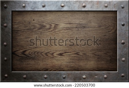 old metal frame over wooden plate